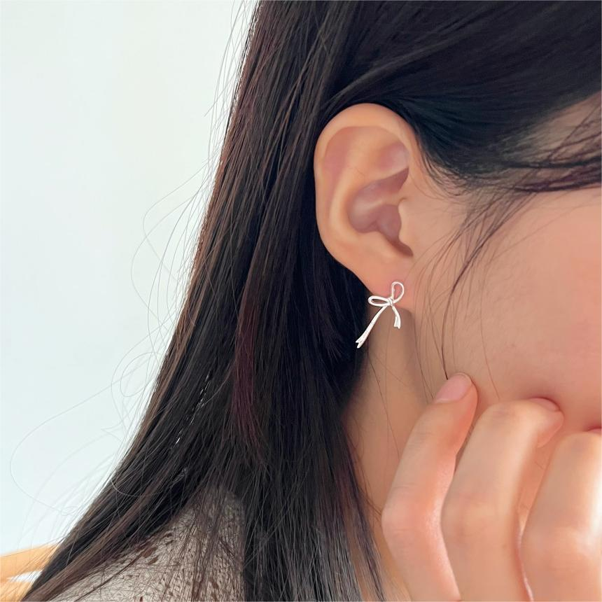 Aretes Lazo Elegante Plateado | Plata 925 | Diseño Minimalista